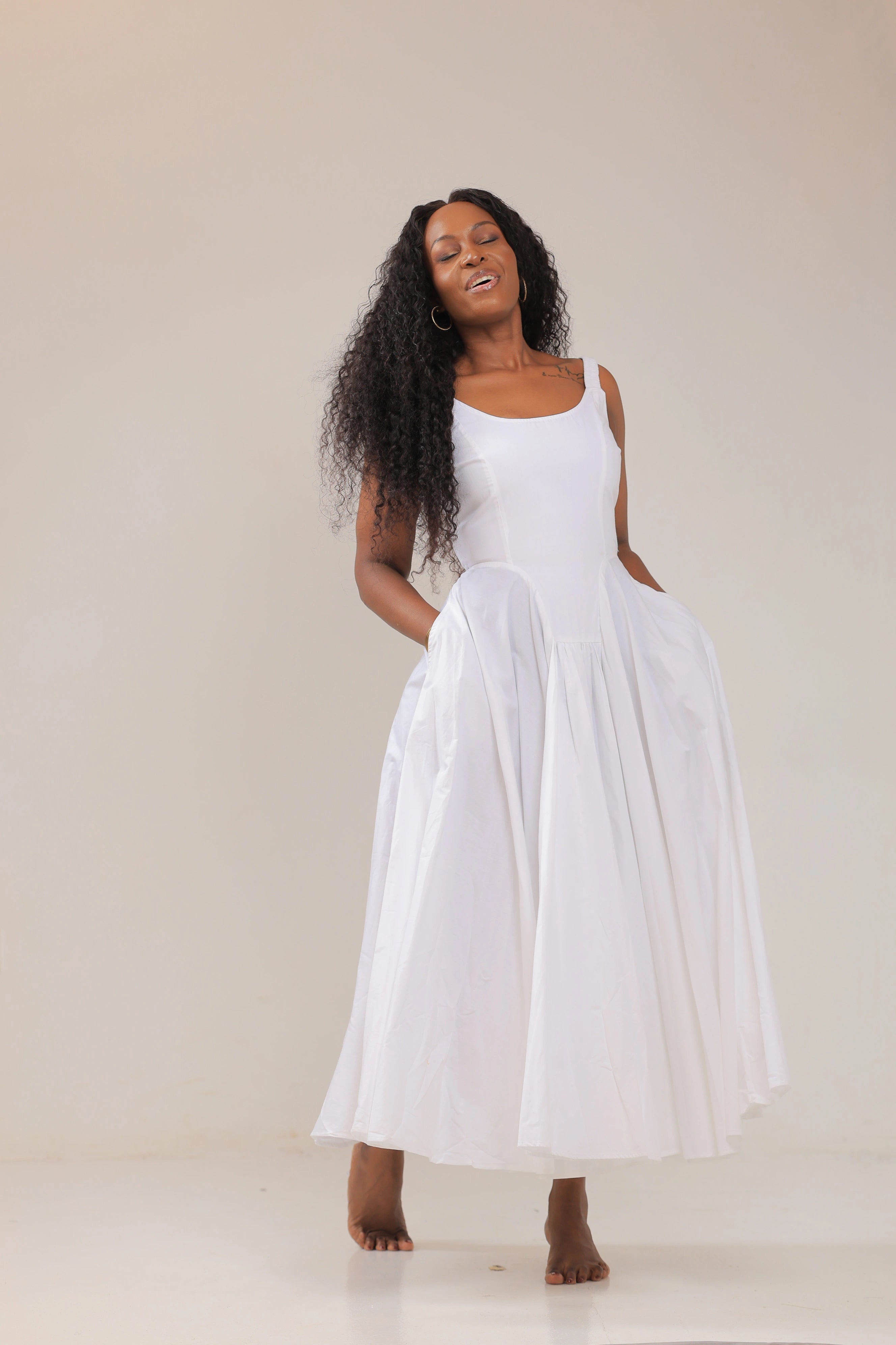 The Nyonyo drop waist maxi white dress
